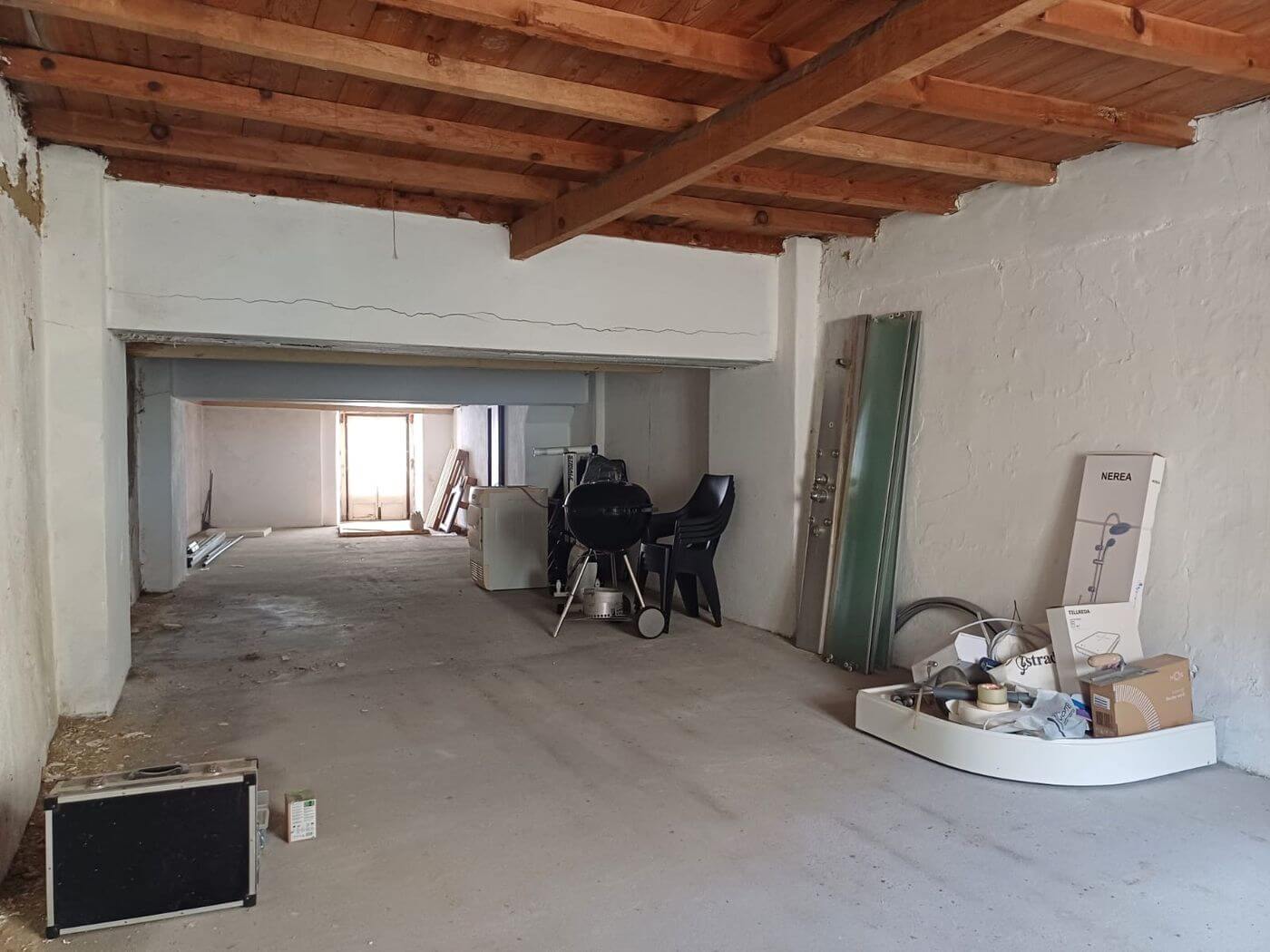 Large open floor with wooden ceiling